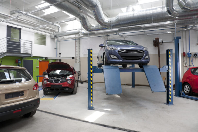 Multiple cars inside the large repair workshop and independent garage at Coventry Service Centre